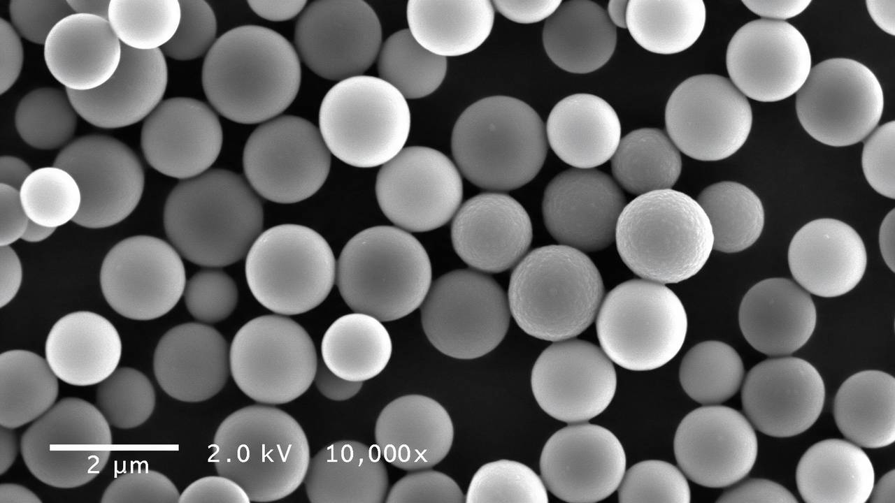 Hollow glass microspheres for lightweight construction and industrial applications