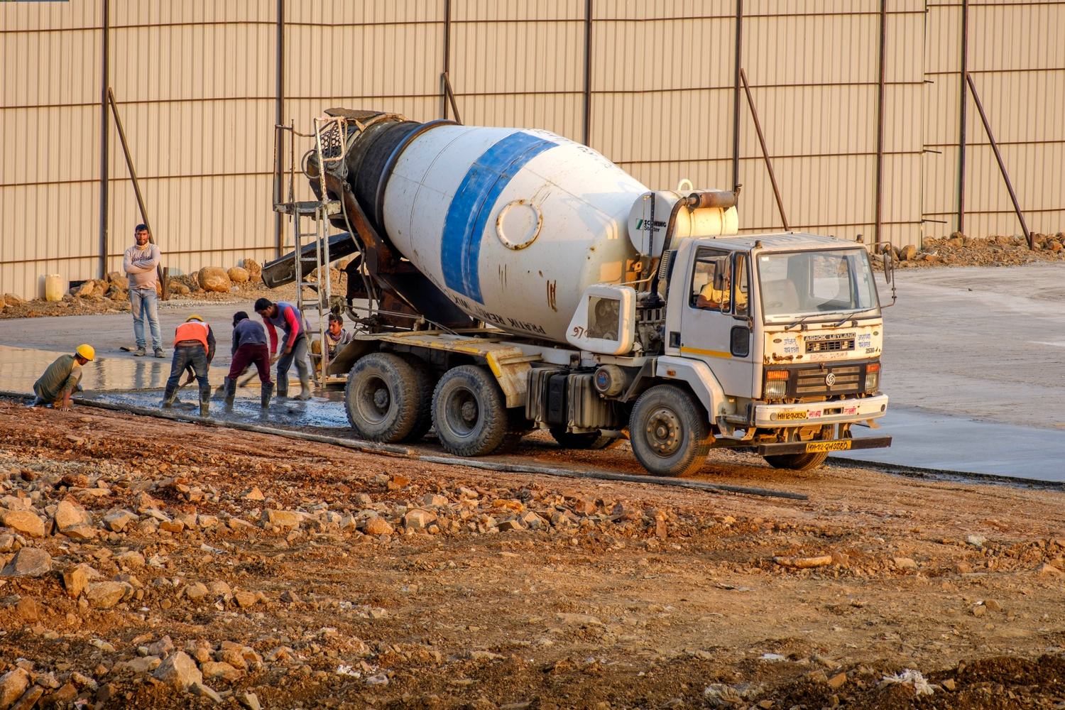 Ready-mix concrete truck transporting formulated concrete