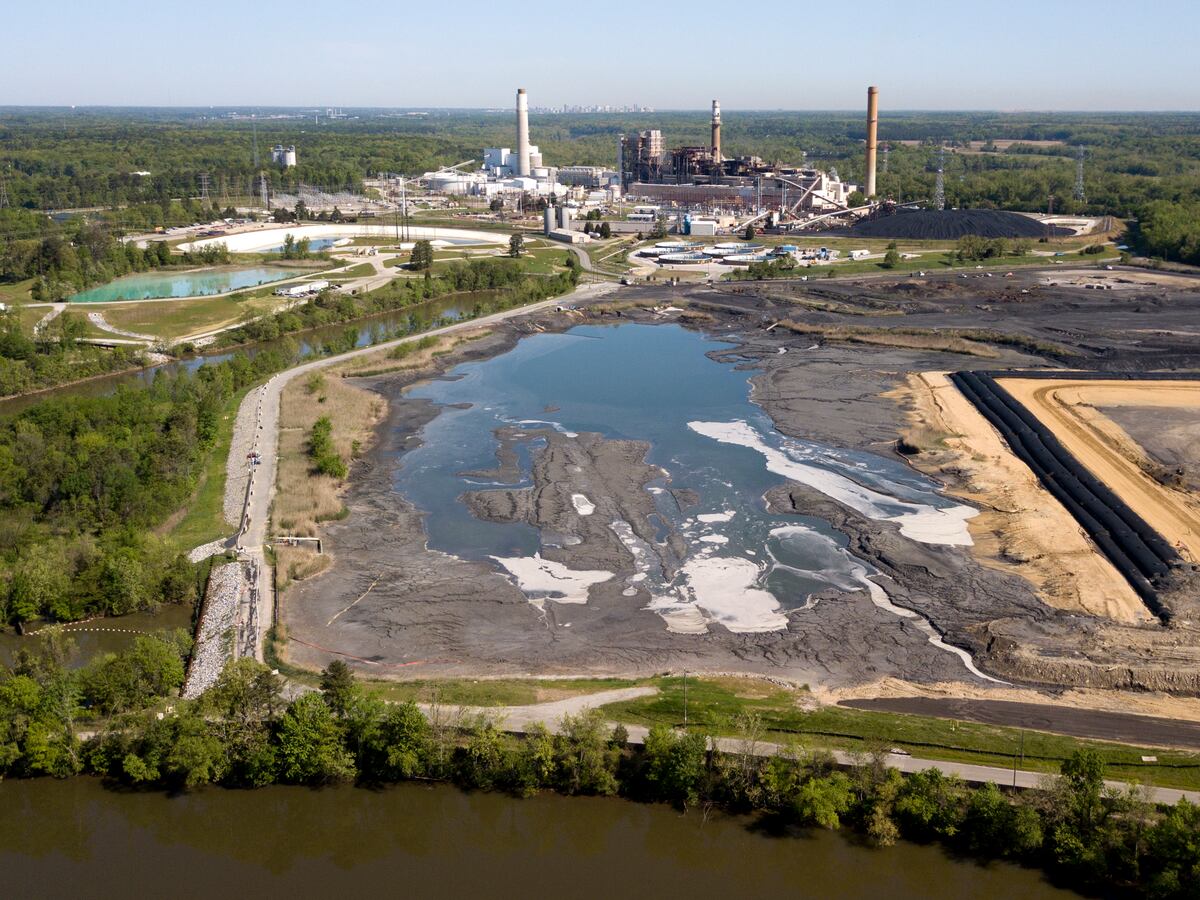 Large ash storage pond and ash mound near a power plant