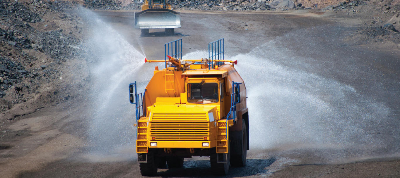 Dust suppression water truck on mine haul road